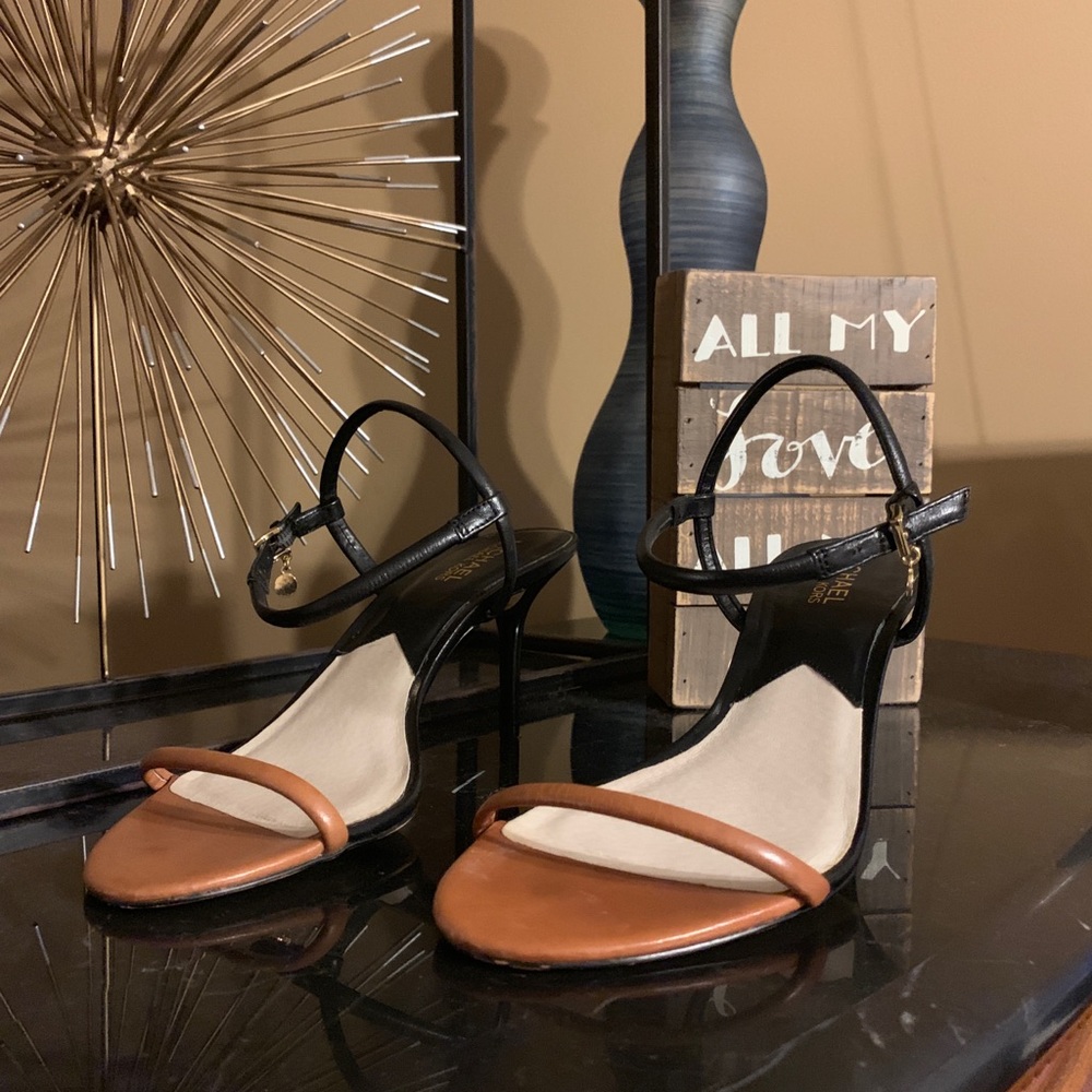 Michael Kors tan and black strappy sandals.